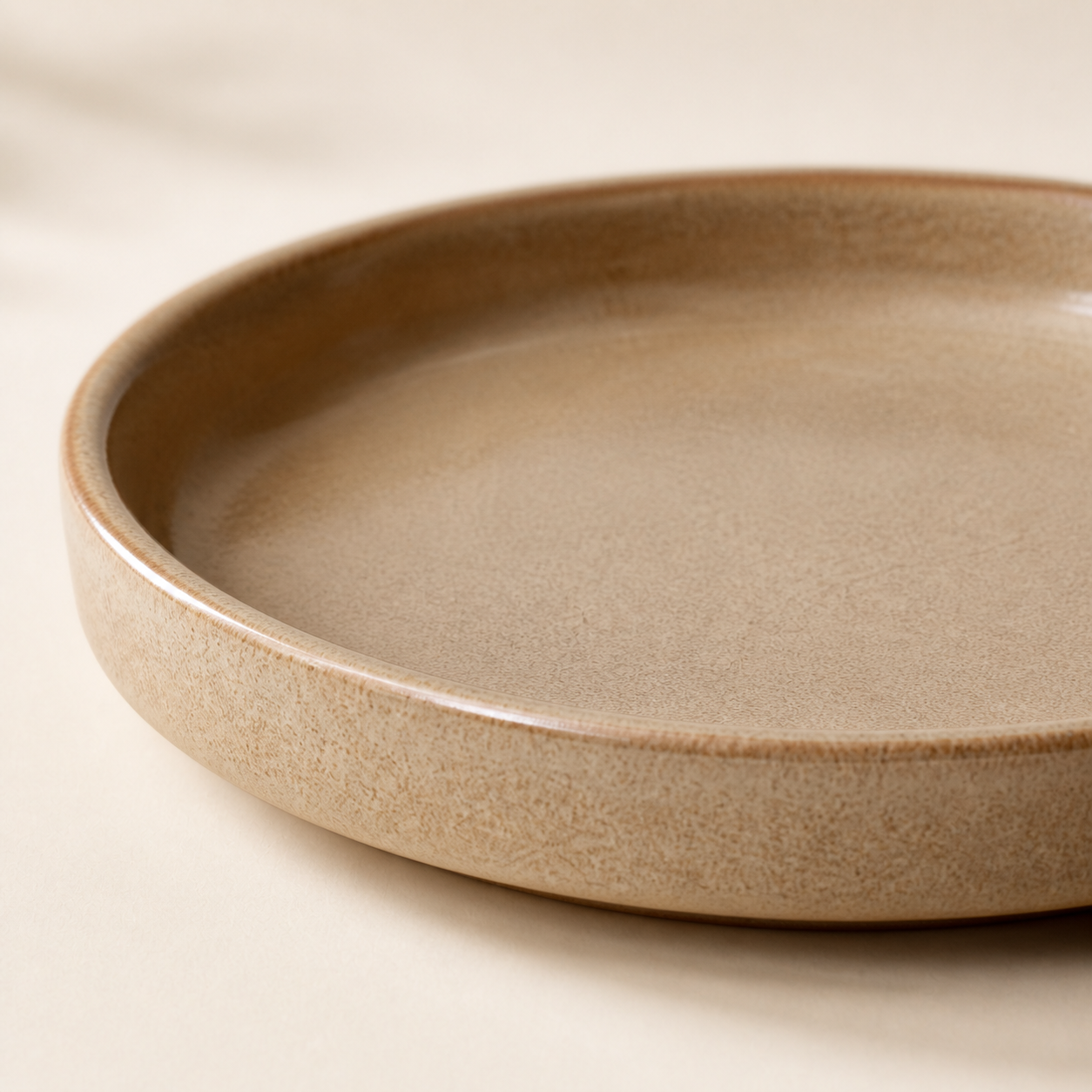 Glazed stoneware detail of the Lune Saucer 14